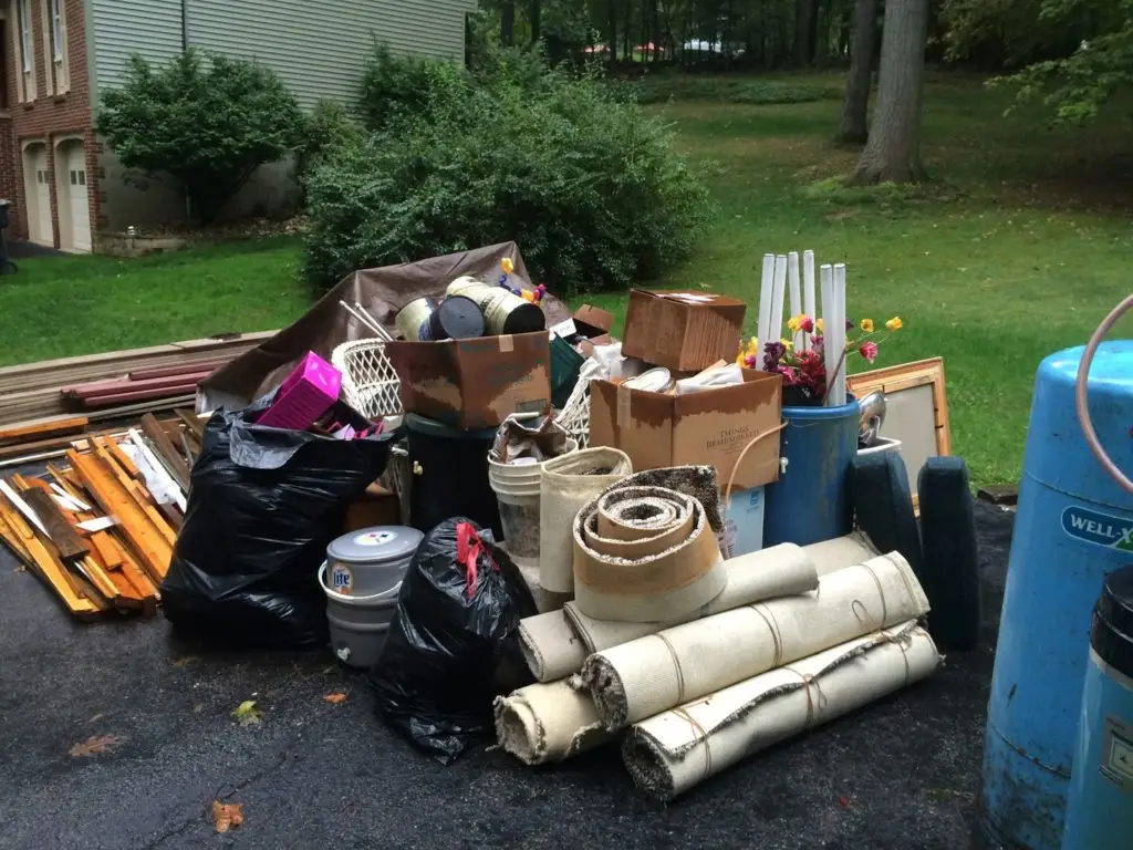 Pile of household items and old furniture ready for junk removal in Mississauga